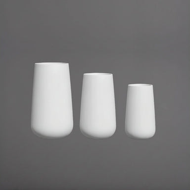 Saigon Tapered Round Fiberglass Planter shown in different sizes.