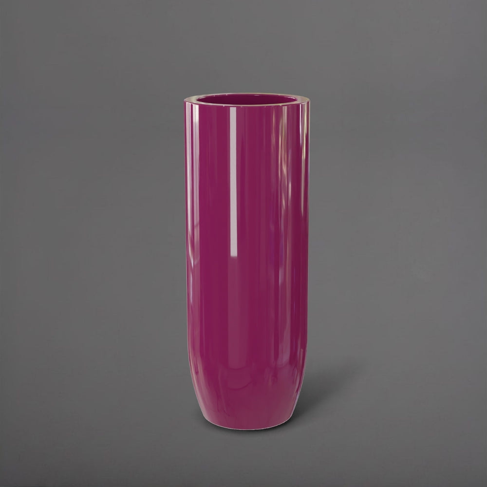 Saint Tropez Tall Bullet Round Fiberglass Planter in gloss eggplant against gray background.
