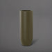 Saint Tropez Tall Bullet Round Fiberglass Planter in matte bronze against gray background.