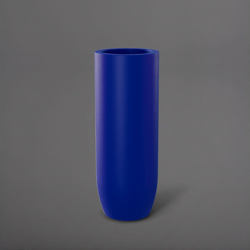 Saint Tropez Tall Bullet Round Fiberglass Planter in matte cobalt blue against gray background.