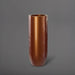 Saint Tropez Tall Bullet Round Fiberglass Planter in metallic bronze against gray background.