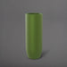 Saint Tropez Tall Bullet Round Fiberglass Planter in satin green against gray background.