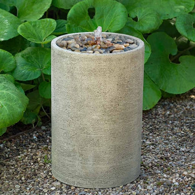 Salinas Pebble Fountain, Tall on gravel in the backyard