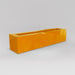 Salon Narrow Rectangle Fiberglass Planter in gloss tangerine against gray background. 