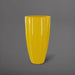 San Jose Tall Fluted Round Fiberglass Planter in gloss saffron against gray background.