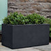 Sandal Planter 361818 S/1 in lead lite on concrete filled with plants.
