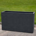 Sandal Planter 591836 S/1 in lead lite on concrete in the backyard.