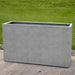 Sandal Planter 591836 S/1 in stone grey lite on concrete in the backyard.