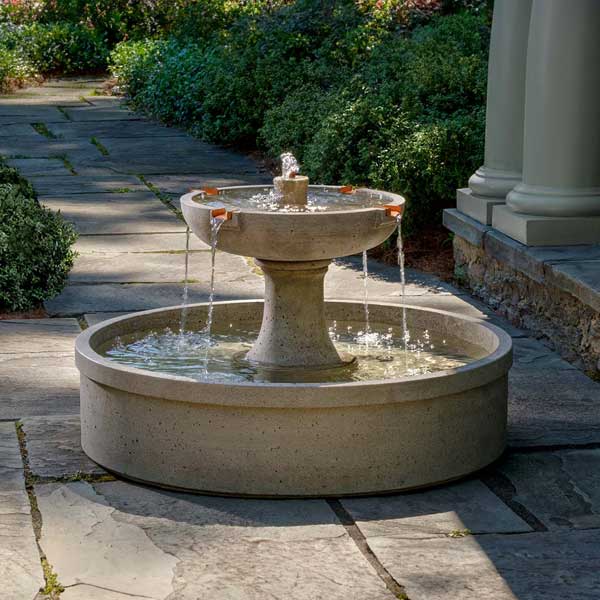 Sanibel Fountain on the concrete with plants background