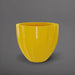 Santa Barbara Fluted Round Fiberglass Planter in gloss saffron against gray background.