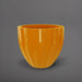 Santa Barbara Fluted Round Fiberglass Planter in gloss tangerine against gray background.