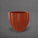 Santa Barbara Fluted Round Fiberglass Planter in matte terra cotta against gray background.