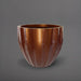 Santa Barbara Fluted Round Fiberglass Planter in metallic bronze against gray background.