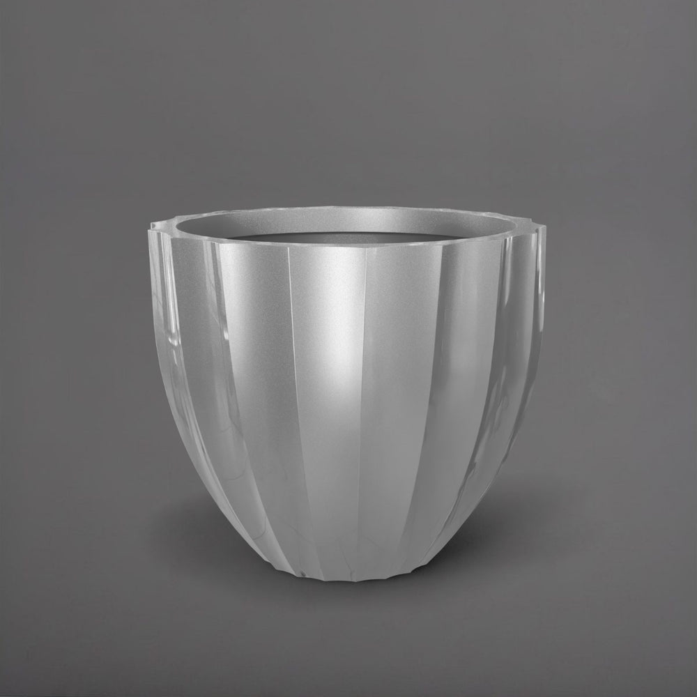 Santa Barbara Fluted Round Fiberglass Planter in metallic silver against gray background.