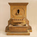 Savonna Wall Fountain with Step against brown background.
