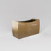 Seoul Modern Curved Rectangle Fiberglass Planter in gloss metallic gold against gray background.