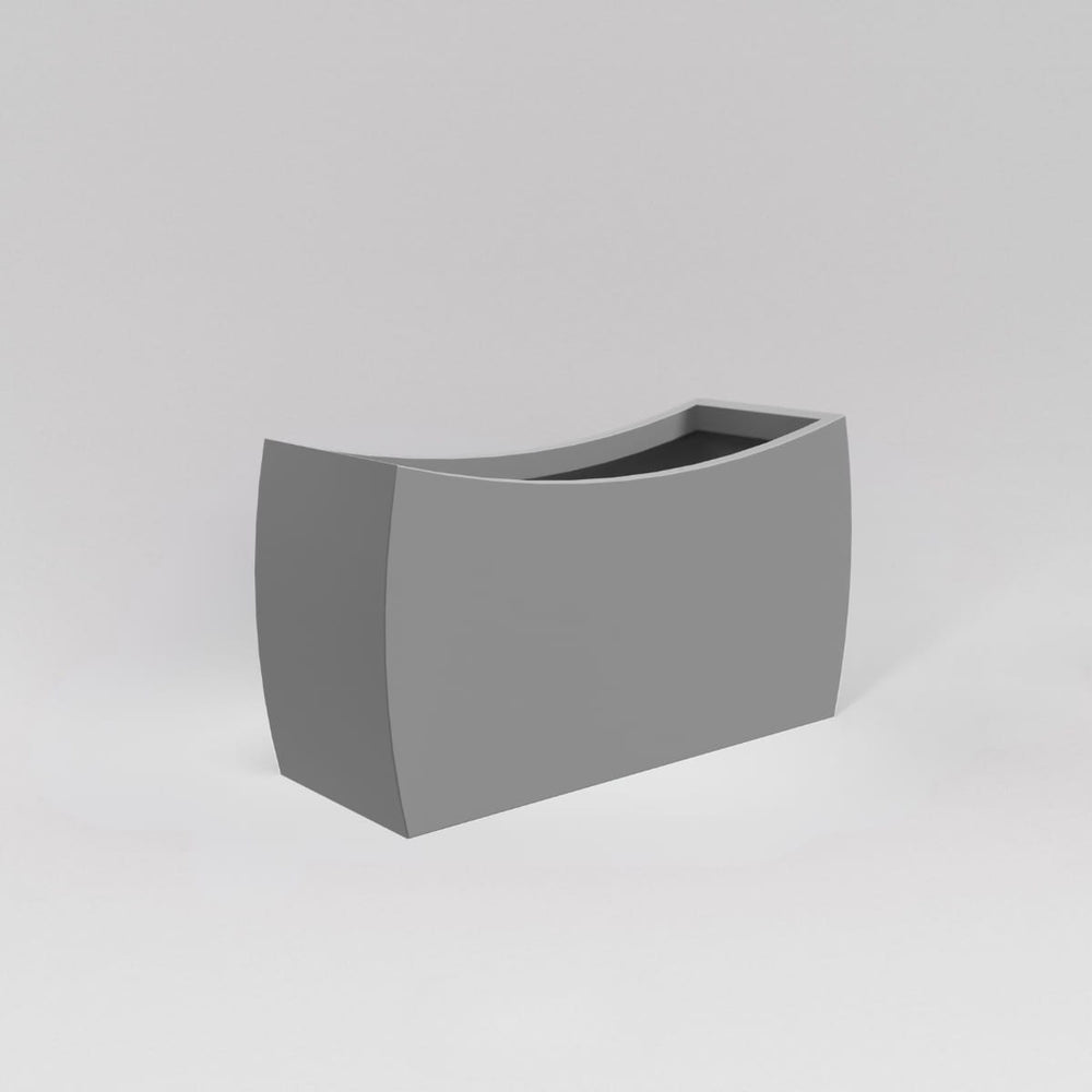 Seoul Modern Curved Rectangle Fiberglass Planter in matte cement grey against gray background.
