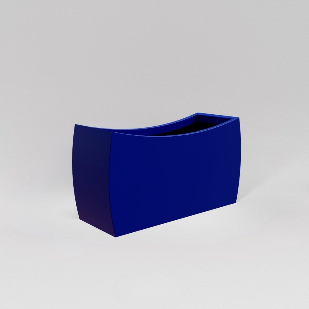 Seoul Modern Curved Rectangle Fiberglass Planter in matte cobalt blue against gray background.