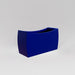 Seoul Modern Curved Rectangle Fiberglass Planter in matte cobalt blue against gray background.
