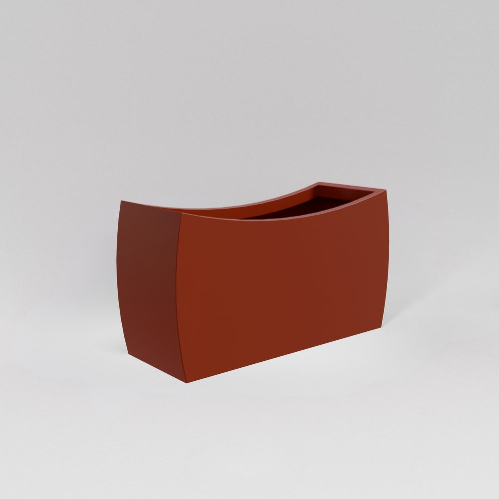 Seoul Modern Curved Rectangle Fiberglass Planter in matte terra cotta against gray background.