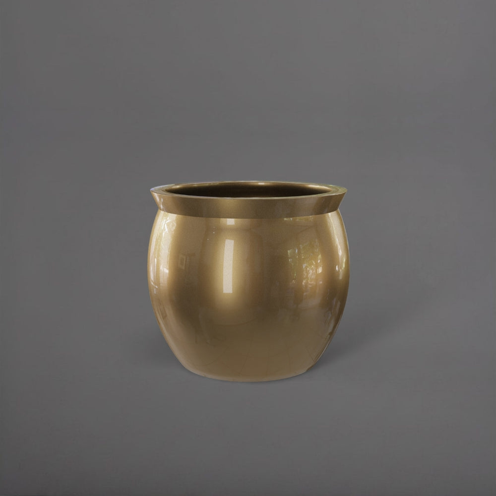 Shanghai Fishbowl Fiberglass Planter in gloss metallic gold against gray background.