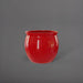 Shanghai Fishbowl Fiberglass Planter in gloss red against gray background.