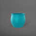 Shanghai Fishbowl Fiberglass Planter in satin seafoam green against gray background.