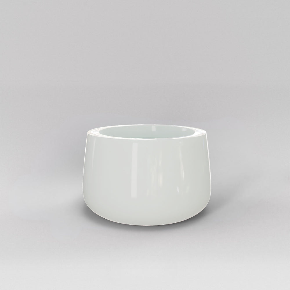 Short Hayden Tapered Round Fiberglass Planter in gloss bright white against gray background.