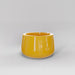 Short Hayden Tapered Round Fiberglass Planter in gloss saffron against gray background.