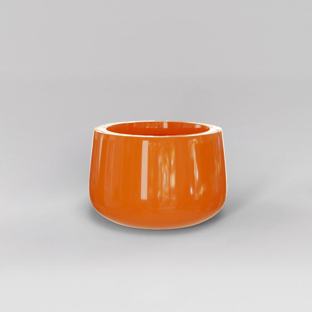 Short Hayden Tapered Round Fiberglass Planter in gloss tangerine against gray background.