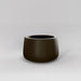 Short Hayden Tapered Round Fiberglass Planter in matte bronze against gray background.