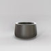 Short Hayden Tapered Round Fiberglass Planter in matte gunmetal against gray background.
