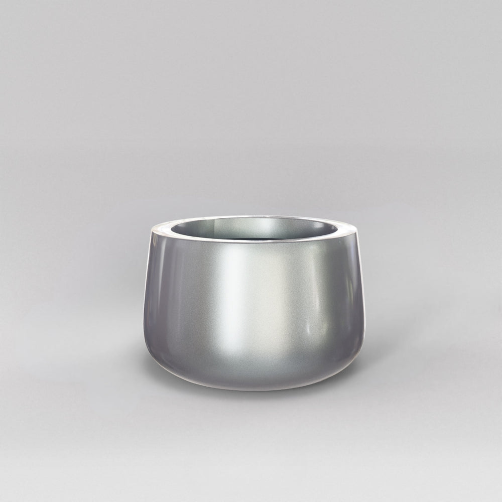Short Hayden Tapered Round Fiberglass Planter in metallic silver against gray background.