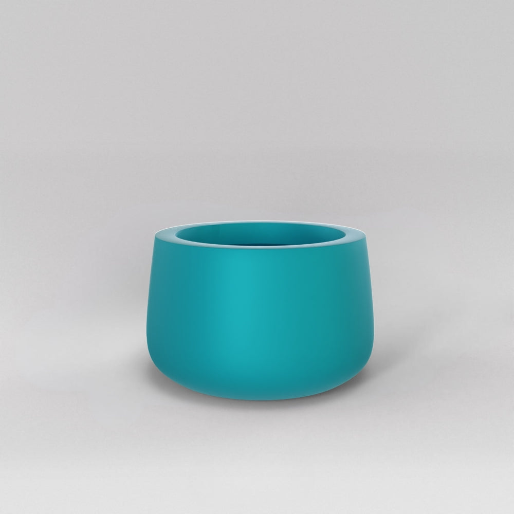 Short Hayden Tapered Round Fiberglass Planter in satin seafoam green against gray background.