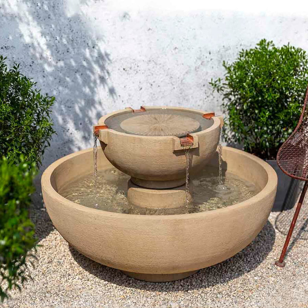 Small Del Rey Outdoor Water feature in action on gravel patio