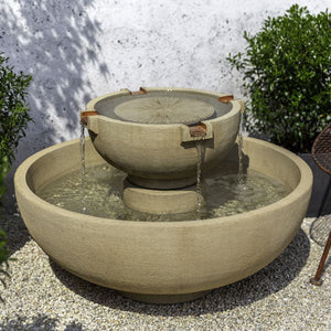 Small Del Rey Outdoor Water feature in action on gravel patio