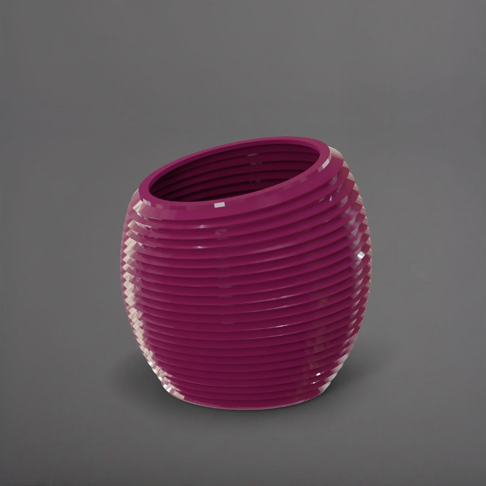 Spiral Globe Fiberglass Planter in gloss eggplant against gray background.