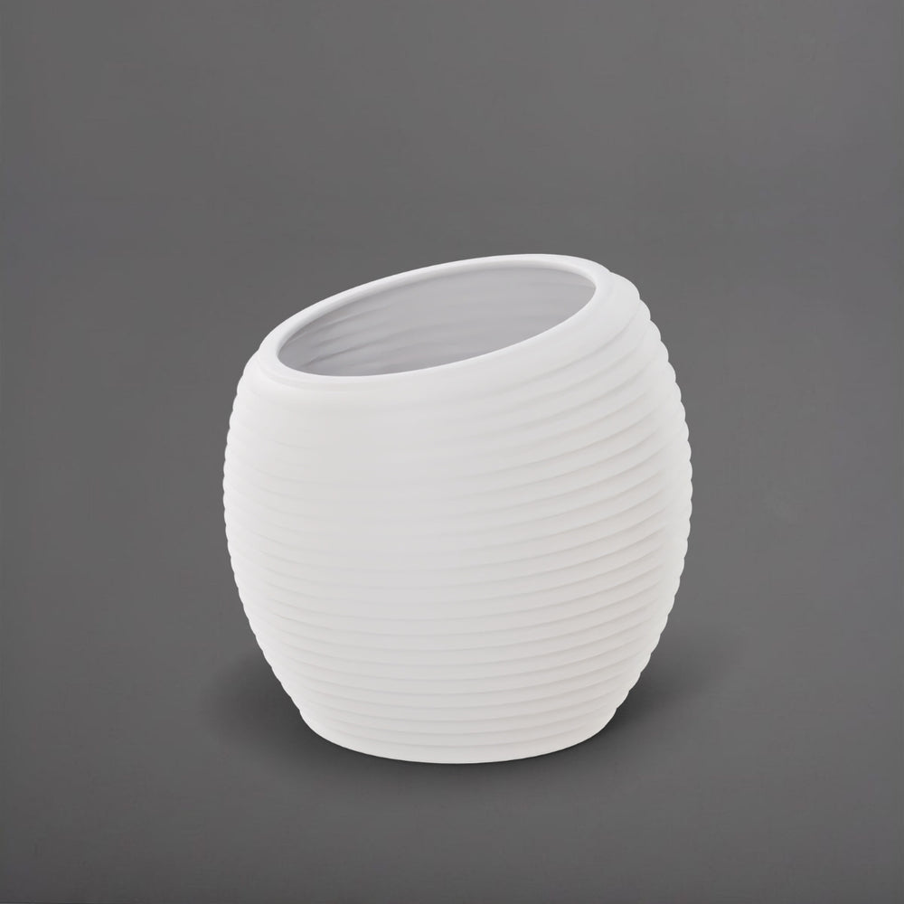Spiral Globe Fiberglass Planter in matte bright white against gray background.