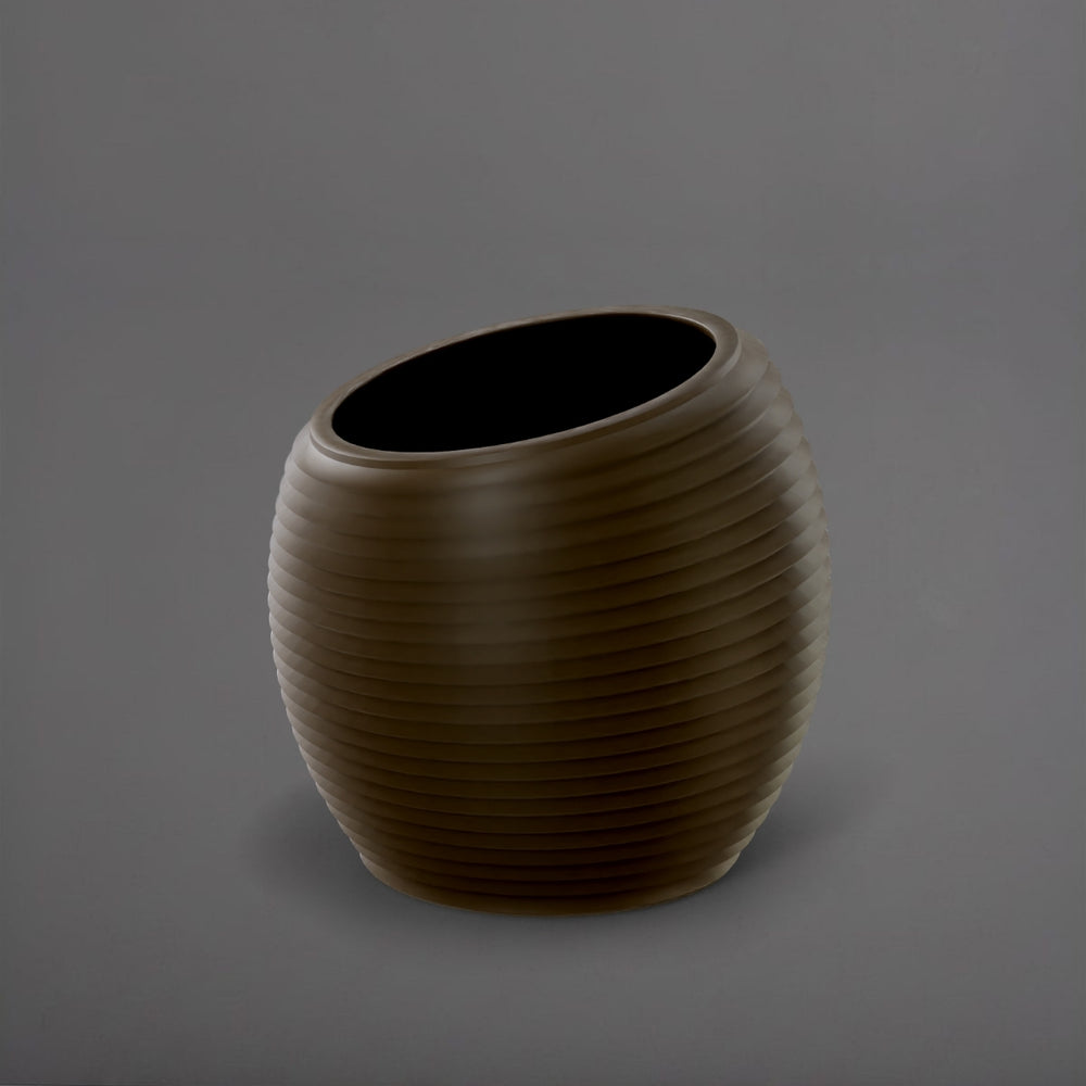 Spiral Globe Fiberglass Planter in matte bronze against gray background.