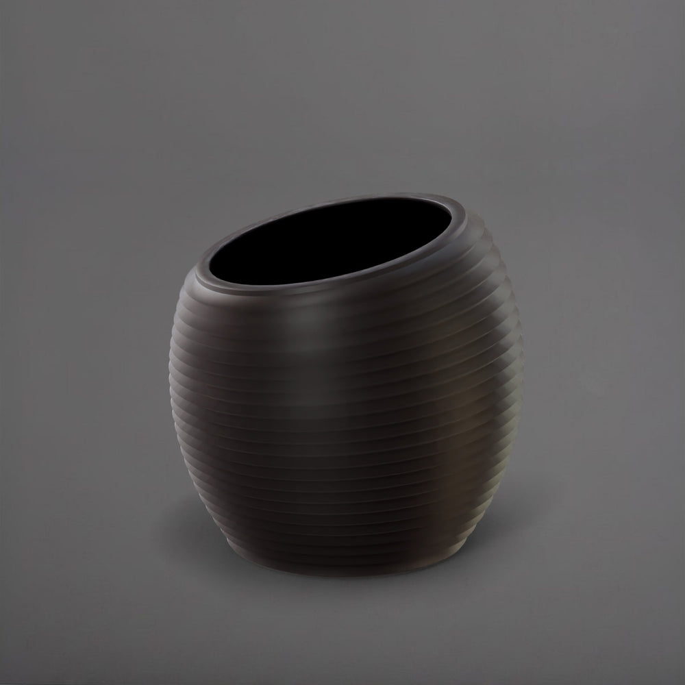 Spiral Globe Fiberglass Planter in matte charcoal against gray background.