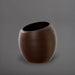 Spiral Globe Fiberglass Planter in matte dark brown against gray background.