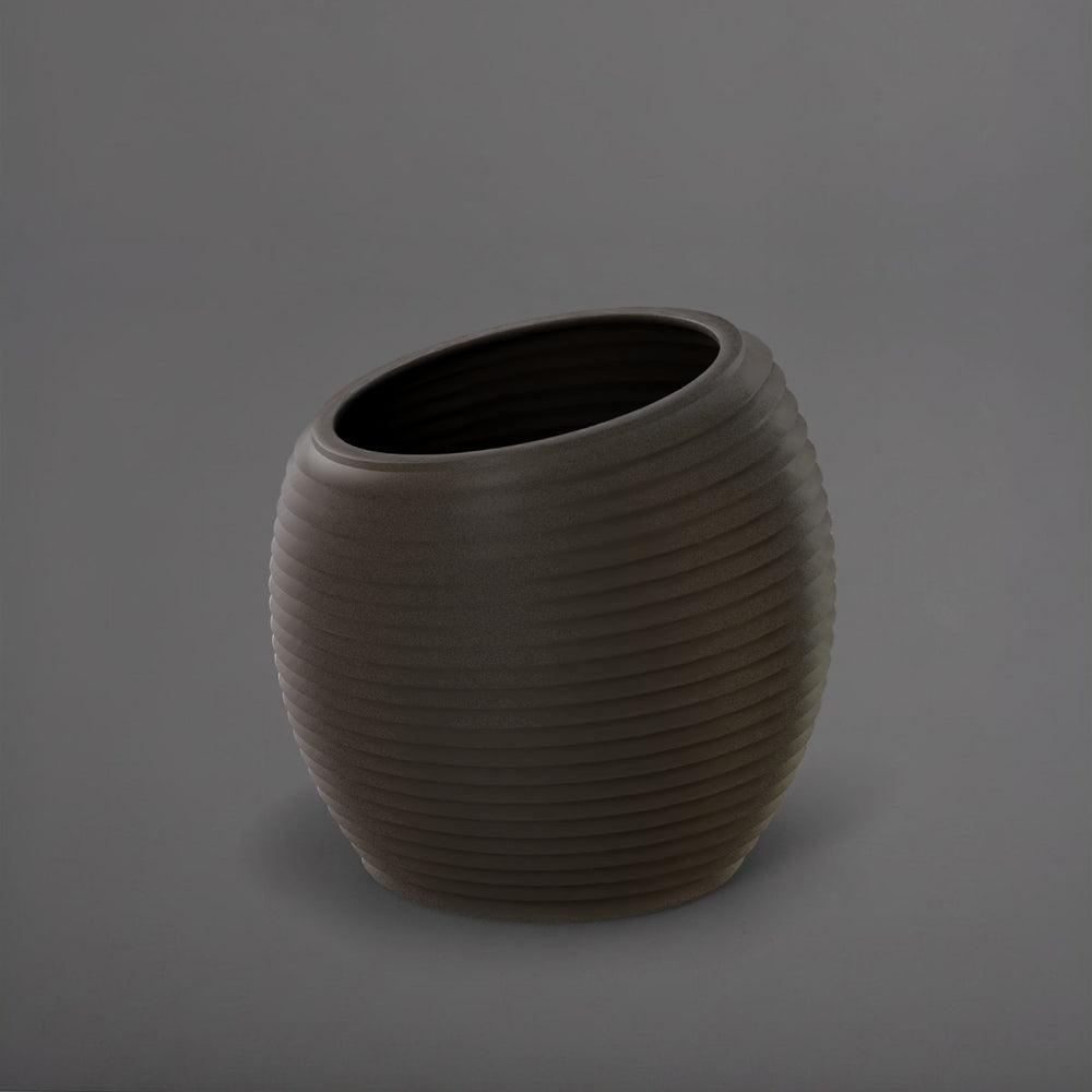 Spiral Globe Fiberglass Planter in matte gunmetal against gray background.