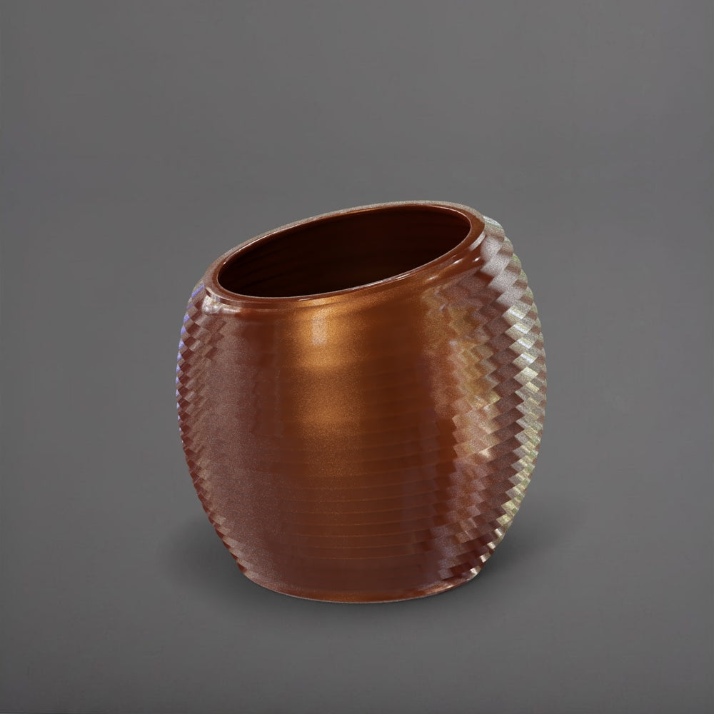 Spiral Globe Fiberglass Planter in metallic bronze against gray background.