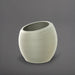 Spiral Globe Fiberglass Planter in satin beige against gray background.