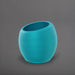 Spiral Globe Fiberglass Planter in satin seafoam green against gray background.
