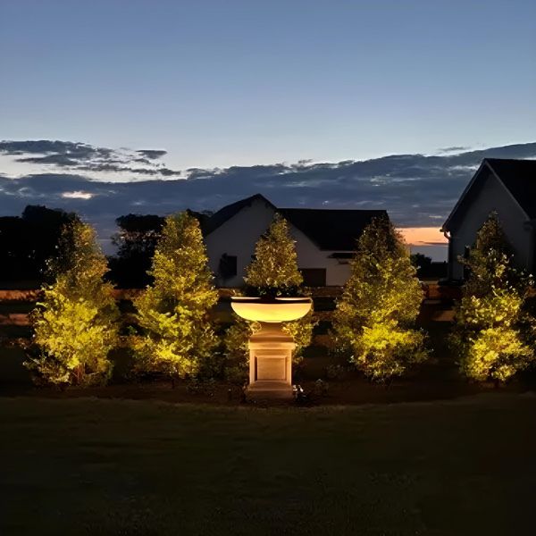 St. Louis Planter with St. Louis Pedestal in the backyard in night view