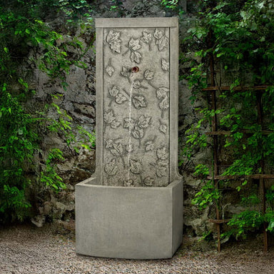 Sugar Hill Wall Fountain on gravel in action.