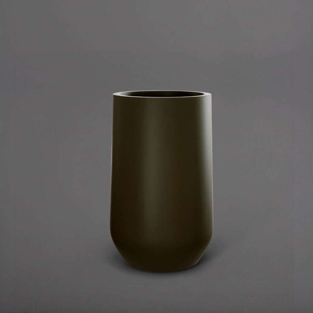 Tall Hayden Tapered Round Fiberglass Planter in matte bronze against gray background.