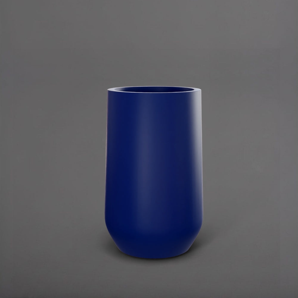 Tall Hayden Tapered Round Fiberglass Planter in matte cobalt blue against gray background.