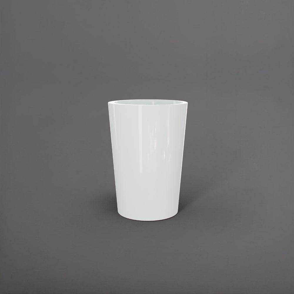 Tagel Tapered Round Fiberglass Planter in gloss bright white against gray background.